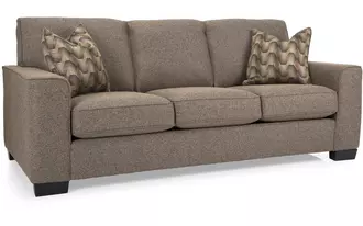 2483 - Sofa with wide arm and Semi Attached back offers a Modern look for a transitional lifestyle. Quality Canadian made upholstery. Optional wood or chrome sofa legs allow you to play with the style.