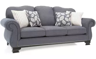 6933 - This sofa is large and in charge with its classic traditional styling.  Semi attached back with classic curve, large rounded arms with nail stud detailing and wood base with ornamental legs.