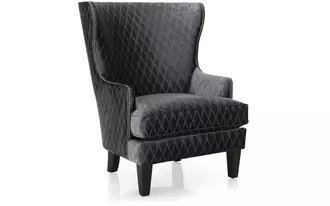 2492 - This chair is timeless and dramatic. Slight wing, slender inviting arm and exaggerated curved back.  Available with 2-tone fabric selection and optional nail studs to add to this chair’s dramatic flair.