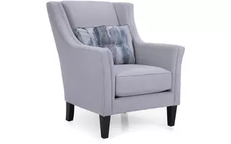 2825 - A chair built for comfort and style. Beautifully detailed with double row nail studs applied to the arm facing and along the bottom band of the chair.   Lumbar pillow with hand button tufting adds to the comfort of this chair. Easily fits into a traditional or transitional lifestyle.