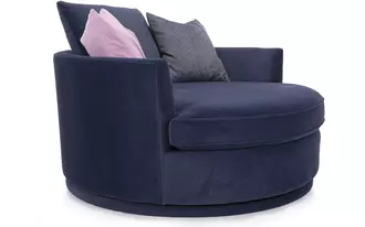 2991-59 - Round out your living room with the contemporary curves of this chair lounger. This inviting swivel chair beckons you to kick off your shoes and snuggle up. A tight barrel back completes the circle with a loose back pillow and several oversized throw pillows.