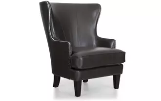 3492 - This chair is timeless and dramatic. Slight wing, slender inviting arm and exaggerated curved back.  Available with 2-tone fabric selection and optional nail studs to add to this chair’s dramatic flair.