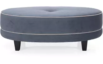 2552 - This Oval Ottoman is stylish and fun, boasting a large center button and optional contrast welt available in fabric.  Classically paired with a curved sofa but has many other styling options.