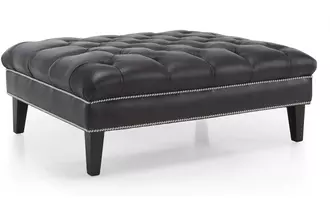 3734 - This expertly hand tufted Ottoman is a statement piece for any home. 7” Wood legs and optional nail studs give this ottoman an air of elegance. Can be used in a traditional or glamorous lifestyles depending on the fabric chosen.