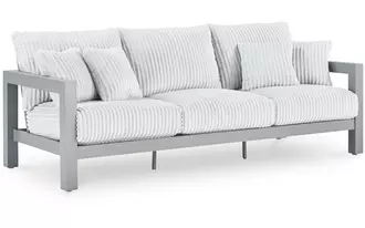 Ashley hurley park sofa with cushion in gray