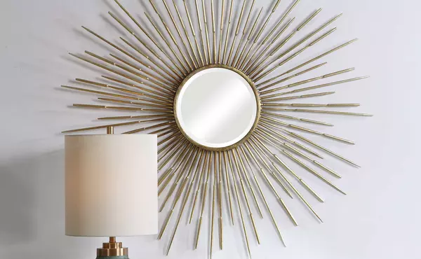 golden rays round mirror by uttermost