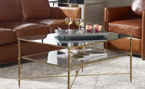 henzler coffee table, gold by uttermost